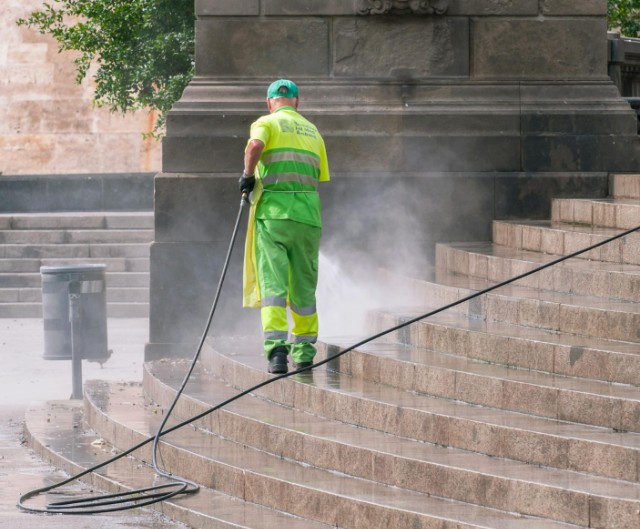Professional power washing service in action